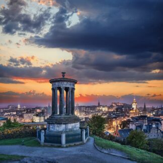 Edinburgh against sunset with Calton Hill in Scotland