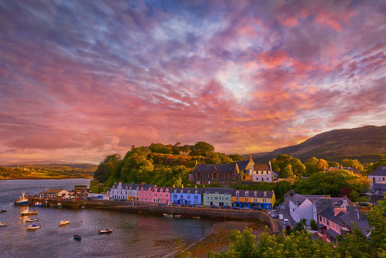 Sunset over famous Quay street in Portree, Isle of Skye